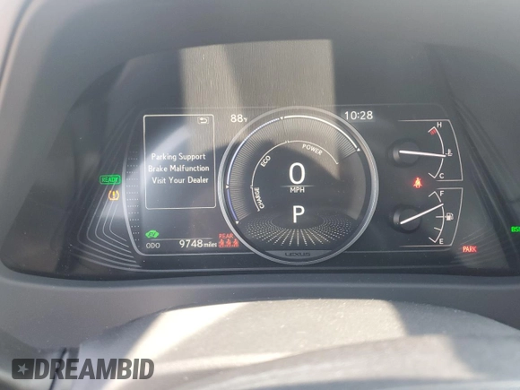 2023 Lexus UX 250h Premium с VIN JTHP9JBHXP2070096, выставлен на аукционе Copart как лот 65645035 с пробегом 9 748 миль миль и Списание • Salvage title. История ставок и продаж доступна на DreamBid. Изображение 9.