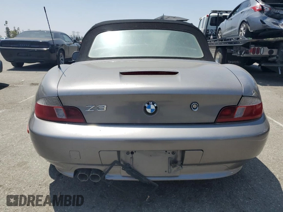 2002 BMW Z3 2.5 z VIN 4USCN334X2LM06491, wystawiony jako Copart lot #61502915 z przebiegiem 110 956 mil mil oraz Szkoda całkowita • Salvage title. Historia ofert i sprzedaży dostępna na DreamBid. Obrazek 6.