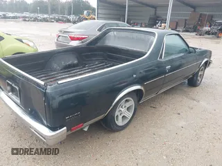 1983 Chevrolet El Camino z VIN 1GCCW80H5DR277552, wystawiony jako IAAI lot #40756516 z przebiegiem 73 947 mil mil oraz . Historia ofert i sprzedaży dostępna na DreamBid. Obrazek 4.