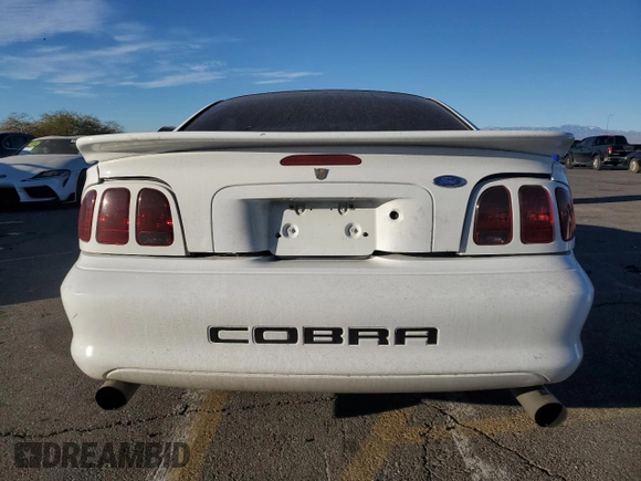 1997 Ford Mustang Cobra with VIN 1FALP47VXVF139807, listed as a Copart auction lot 88045305 with 113,571 mi miles and Salvage Title. Bid and sale history available at carsss.com. Image 6.