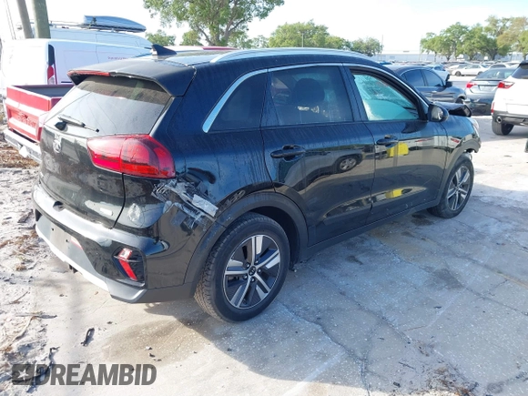2020 Kia Niro LXS with VIN KNDCB3LC2L5422695, listed as a IAAI auction lot 41881263 with 77,197 mi miles. Bid and sale history available at carsss.com. Image 4.