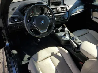 2016 BMW 2 Series 228i xDrive with VIN WBA1L9C55GV324854, listed as a Copart auction lot 77359674 with 101,768 mi miles and Salvage Title. Bid and sale history available at carsss.com. Image 8.