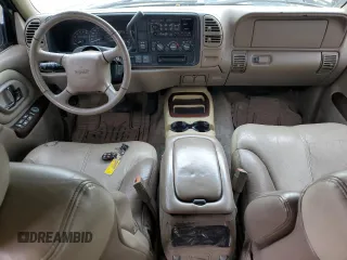 1999 GMC Denali z VIN 1GKEK13R6XR918944, wystawiony jako Copart lot #46049675 z przebiegiem 140 826 mil mil oraz Tytuł czysty. Historia ofert i sprzedaży dostępna na DreamBid. Obrazek 8.