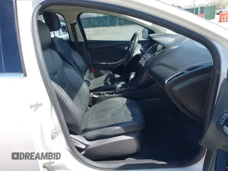 2015 Ford Focus Titanium с VIN 1FADP3J27FL341102, выставлен на аукционе IAAI как лот 41793450 с пробегом 96 465 миль миль и . История ставок и продаж доступна на DreamBid. Изображение 5.