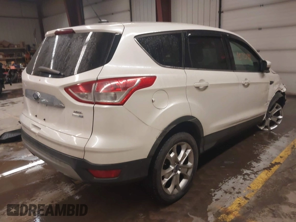 2013 Ford Escape SEL with VIN 1FMCU9H98DUD82751, listed as a IAAI auction lot 41575198 with 166,580 mi miles. Bid and sale history available at carsss.com. Image 4.