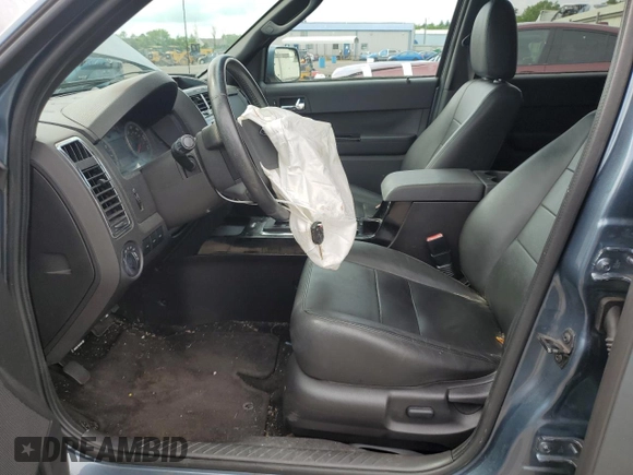 2010 Ford Escape Limited with VIN 1FMCU9EG1AKC28781, listed as a Copart auction lot 61601725 with 99,969 mi miles and Salvage title. Bid and sale history available at DreamBid. Image 7.
