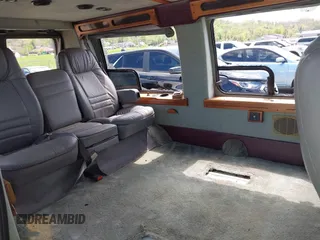 1999 Ford Econoline Cargo Recreational with VIN 1FDRE14L2XHA41059, listed as a IAAI auction lot 42067879 with 149,185 mi miles. Bid and sale history available at carsss.com. Image 8.