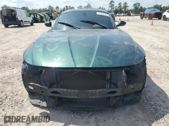 2011 BMW Z4 sDrive30i with VIN WBALM5C55BE495921, listed as a Copart auction lot 71453304 with 116,136 mi miles and Salvage Title. Bid and sale history available at carsss.com. Image 5.