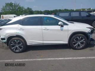 2020 Lexus RX 450h с VIN 2T2HGMDAXLC052802, выставлен на аукционе IAAI как лот 42422920 с пробегом 63 609 миль миль и . История ставок и продаж доступна на DreamBid. Изображение 13.