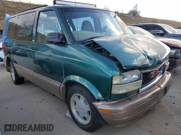 2003 GMC Safari z VIN 1GKEL19X83B512525, wystawiony jako Copart lot #79059984 z przebiegiem 122 800 mil mil oraz Szkody całkowita. Historia ofert i sprzedaży dostępna na DreamBid. Obrazek 4.
