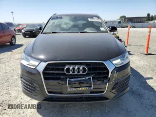 2018 Audi Q3 Premium z VIN WA1BCCFS5JR019032, wystawiony jako Copart lot #55840355 z przebiegiem 63 619 mil mil oraz Tytuł czysty. Historia ofert i sprzedaży dostępna na DreamBid. Obrazek 5.