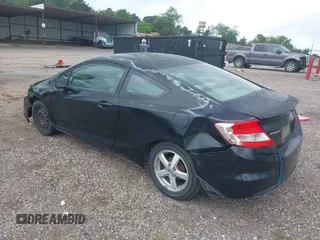 2012 Honda Civic Cpe LX with VIN 2HGFG3B59CH565932, listed as a IAAI auction lot 41949011 with 213,786 mi miles. Bid and sale history available at carsss.com. Image 3.