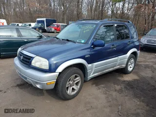 2003 Suzuki Grand Vitara with VIN JS3TD62V534105807, listed as a IAAI auction lot 41662214 with 111,087 mi miles. Bid and sale history available at carsss.com. Image 2.