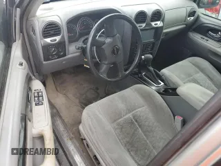 2005 GMC Envoy SLT with VIN 1GKET16S656102004, listed as a Copart auction lot 74543124 with Not Provided miles and Salvage Title. Bid and sale history available at DreamBid. Image 8.