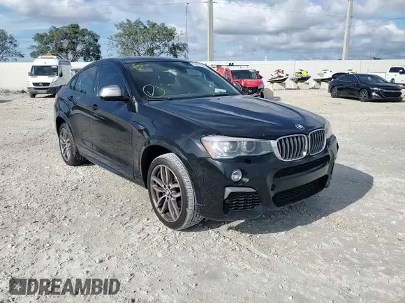 2017 BMW X4 M40i with VIN 5UXXW7C55H0U24877, listed as a Copart auction lot 71824502 with 0 mi miles. Bid and sale history available at carsss.com. Image 12.