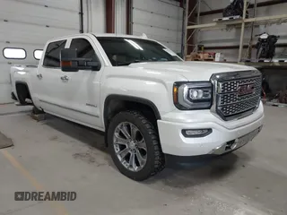 2017 GMC Sierra 1500 Denali z VIN 3GTU2PEJ6HG142608, wystawiony jako IAAI lot #41991070 z przebiegiem 113 941 mil mil oraz . Historia ofert i sprzedaży dostępna na DreamBid. Obrazek 1.