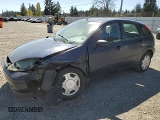 2004 Ford Focus ZX5 z VIN 3FAFP37354R114742, wystawiony jako Copart lot #53533315 z przebiegiem 383 279 mil mil oraz Szkoda całkowita • Salvage title. Historia ofert i sprzedaży dostępna na DreamBid. Obrazek 1.