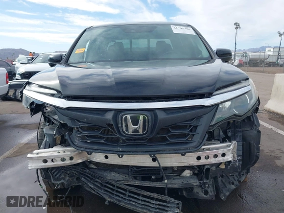 2017 Honda Ridgeline RTL-E with VIN 5FPYK3F7XHB030565, listed as a IAAI auction lot 41795386 with 79,252 mi miles and . Bid and sale history available at DreamBid. Image 13.