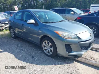 2012 Mazda 3 i Sport with VIN JM1BL1UG1C1521837, listed as a IAAI auction lot 42688611 with 169,101 mi miles and . Bid and sale history available at DreamBid. Image 1.