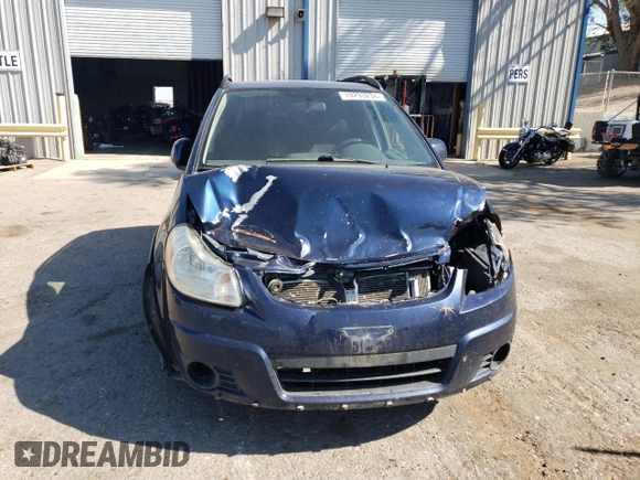 2011 Suzuki SX4 Crossover with VIN JS2YB5A36B6300828, listed as a Copart auction lot 70293234 with 173,898 mi miles and Salvage Title. Bid and sale history available at carsss.com. Image 5.