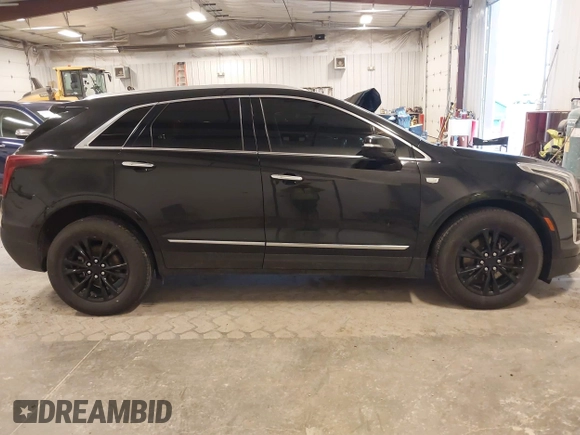 2021 Cadillac XT5 AWD Premium Luxury with VIN 1GYKNDR41MZ129884, listed as a IAAI auction lot 41835444 with 61,878 mi miles and . Bid and sale history available at DreamBid. Image 13.