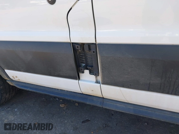2023 Ford Transit Cargo with VIN 1FTBR1C88PKA07752, listed as a IAAI auction lot 41590510 with 71,062 mi miles and . Bid and sale history available at DreamBid. Image 19.