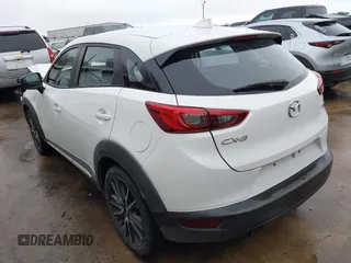 2016 Mazda CX-3 Grand Touring with VIN JM1DKBD73G0124742, listed as a IAAI auction lot 41448684 with 96,322 mi miles. Bid and sale history available at carsss.com. Image 3.