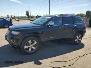 2015 Jeep Grand Cherokee Overland with VIN 1C4RJFCT6FC628729, listed as a Copart auction lot 50192705 with 106,102 mi miles and Salvage Title. Bid and sale history available at carsss.com. Image 1.