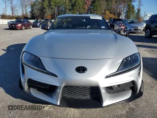 2022 Toyota GR Supra 2.0 with VIN WZ1DB2C08NW046734, listed as a Copart auction lot 83992154 with 43,576 mi miles and Salvage Title. Bid and sale history available at carsss.com. Image 5.