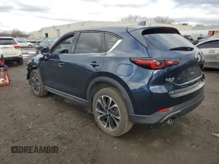 2022 Mazda CX-5 2.5 S Premium Package with VIN JM3KFBDM8N1523940, listed as a Copart auction lot 49619375 with 47,625 mi miles and Salvage Title. Bid and sale history available at carsss.com. Image 2.