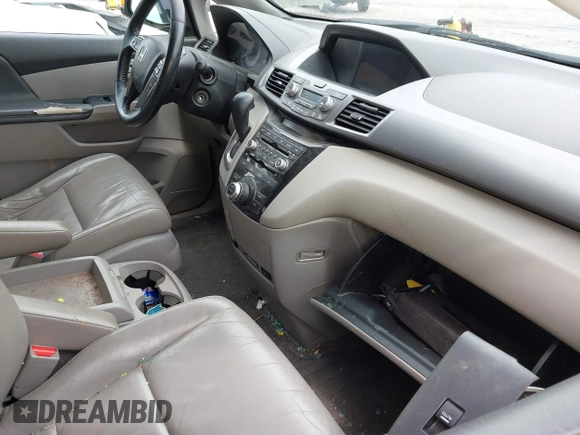 2012 Honda Odyssey Touring с VIN 5FNRL5H90CB083157, выставлен на аукционе IAAI как лот 42176609 с пробегом 250 000 миль миль и . История ставок и продаж доступна на DreamBid. Изображение 5.