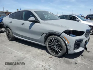 2022 BMW X6 xDrive40i z VIN 5UXCY6C01N9M95573, wystawiony jako Copart lot #54049805 z przebiegiem 24 031 mil mil oraz Szkoda całkowita • Salvage title. Historia ofert i sprzedaży dostępna na DreamBid. Obrazek 4.