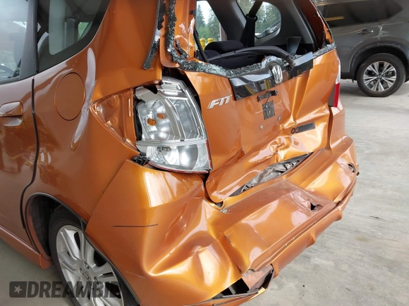 2010 Honda Fit Sport with VIN JHMGE8G41AS005199, listed as a IAAI auction lot 42272621 with 205,682 mi miles and . Bid and sale history available at DreamBid. Image 6.