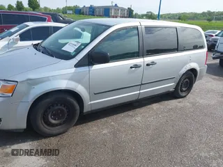 2008 Dodge Grand Caravan SE with VIN 1D8HN44H68B100343, listed as a IAAI auction lot 42126581 with 228,669 mi miles and . Bid and sale history available at DreamBid. Image 18.