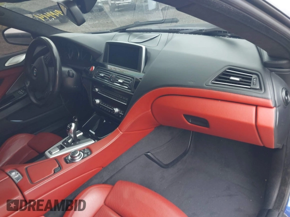 2014 BMW M6 z VIN WBS6C9C54EDV73943, wystawiony jako IAAI lot #42294944 z przebiegiem 129 823 mil mil oraz . Historia ofert i sprzedaży dostępna na DreamBid. Obrazek 5.