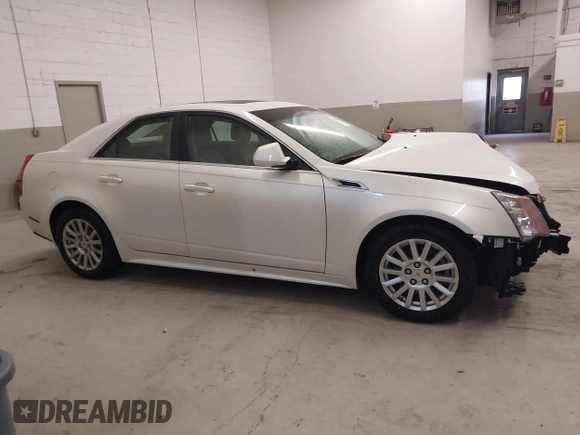 2011 Cadillac CTS Sedan Luxury with VIN 1G6DG5EY0B0144100, listed as a IAAI auction lot 41064767 with 87,922 mi miles. Bid and sale history available at carsss.com. Image 14.