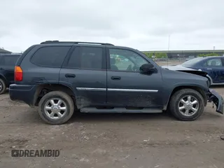 2007 GMC Envoy SLE z VIN 1GKDS13S572214421, wystawiony jako IAAI lot #42186747 z przebiegiem Nie podano mil oraz . Historia ofert i sprzedaży dostępna na DreamBid. Obrazek 13.