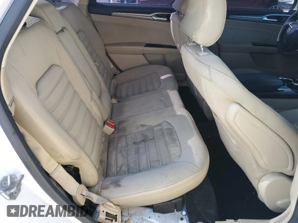 2016 Ford Fusion SE Hybrid с VIN 3FA6P0LU2GR360066, выставлен на аукционе Copart как лот 84767824 с пробегом 153 044 миль миль и Списание • Salvage title. История ставок и продаж доступна на DreamBid. Изображение 10.