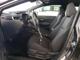 2024 Toyota Corolla Hatchback SE with VIN JTND4MBE1R3221507, listed as a Copart auction lot 68064254 with 9,839 mi miles and Salvage Title. Bid and sale history available at carsss.com. Image 7.