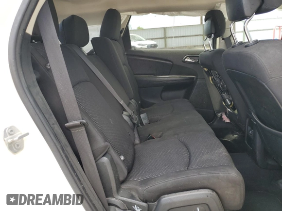 2018 Dodge Journey SXT with VIN 3C4PDDBG6JT141759, listed as a Copart auction lot 53974645 with 142,335 mi miles and Salvage title. Bid and sale history available at DreamBid. Image 11.