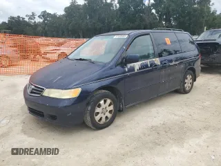 2004 Honda Odyssey EX-L with VIN 5FNRL18044B090687, listed as a Copart auction lot 63460065 with 241,480 mi miles and Salvage title. Bid and sale history available at DreamBid. Image 1.