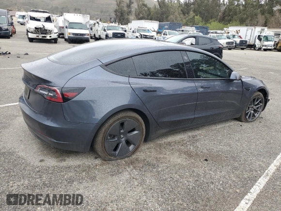 2023 Tesla Model 3 with VIN 5YJ3E1EA9PF543672, listed as a Copart auction lot 48211035 with Not Provided miles and Salvage Title. Bid and sale history available at DreamBid. Image 3.