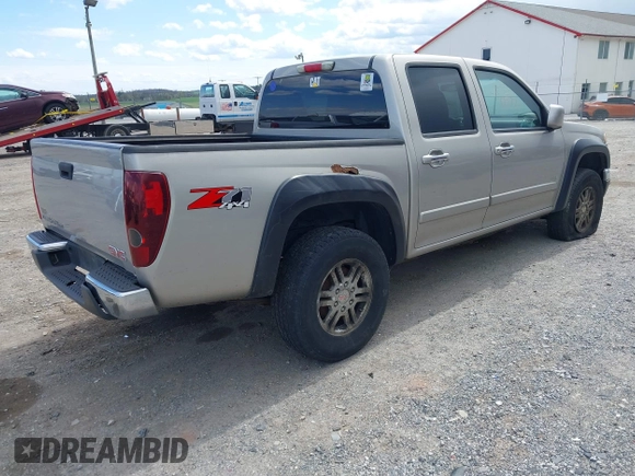 2009 GMC Canyon SLE1 z VIN 1GTDT13E398100890, wystawiony jako IAAI lot #42030572 z przebiegiem 160 181 mil mil oraz . Historia ofert i sprzedaży dostępna na DreamBid. Obrazek 4.