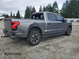 2023 Ford F-150 Lightning Pro with VIN 1FTVW1EL8PWG38419, listed as a Copart auction lot 47630535 with 11,940 mi miles and Salvage Title. Bid and sale history available at DreamBid. Image 3.