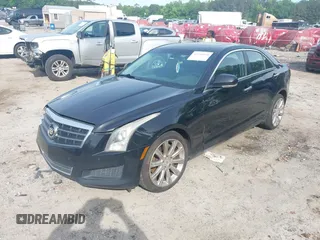 2014 Cadillac ATS Luxury AWD z VIN 1G6AH5RX1E0164796, wystawiony jako IAAI lot #42211010 z przebiegiem 167 079 mil mil oraz . Historia ofert i sprzedaży dostępna na DreamBid. Obrazek 2.