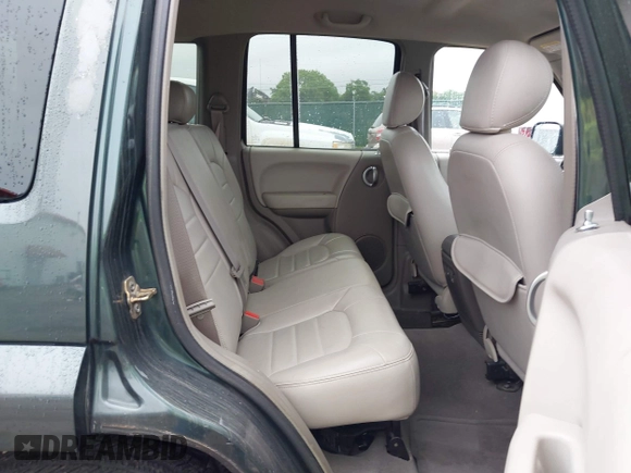 2002 Jeep Liberty Limited z VIN 1J4GL58K12W213087, wystawiony jako IAAI lot #42196895 z przebiegiem 85 110 mil mil oraz . Historia ofert i sprzedaży dostępna na DreamBid. Obrazek 8.
