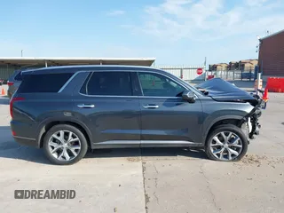 2020 Hyundai Palisade SEL z VIN KM8R34HE3LU091392, wystawiony jako IAAI lot #42185005 z przebiegiem 52 023 mil mil oraz . Historia ofert i sprzedaży dostępna na DreamBid. Obrazek 12.