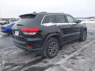 2019 Jeep Grand Cherokee Laredo E with VIN 1C4RJFAGXKC834233, listed as a IAAI auction lot 41392437 with 81,005 mi miles. Bid and sale history available at carsss.com. Image 4.
