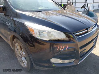 2013 Ford Escape SEL with VIN 1FMCU0H9XDUC42566, listed as a IAAI auction lot 42087717 with 233,091 mi miles. Bid and sale history available at carsss.com. Image 6.