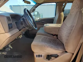 1999 Ford F-350 with VIN 1FTWX32F6XED54952, listed as a Copart auction lot 57676805 with 146,544 mi miles and Salvage title. Bid and sale history available at DreamBid. Image 7.